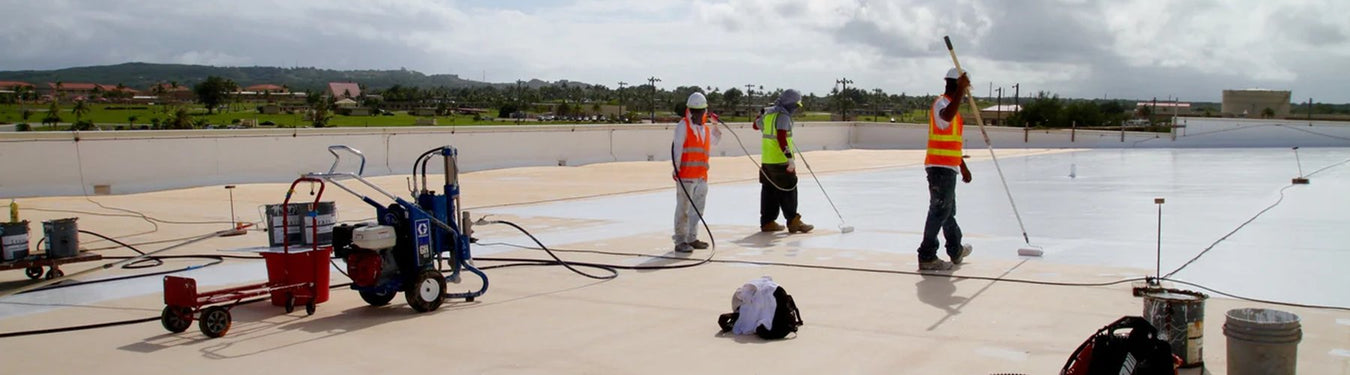 Concrete roof being coated with silicone roof coatings.